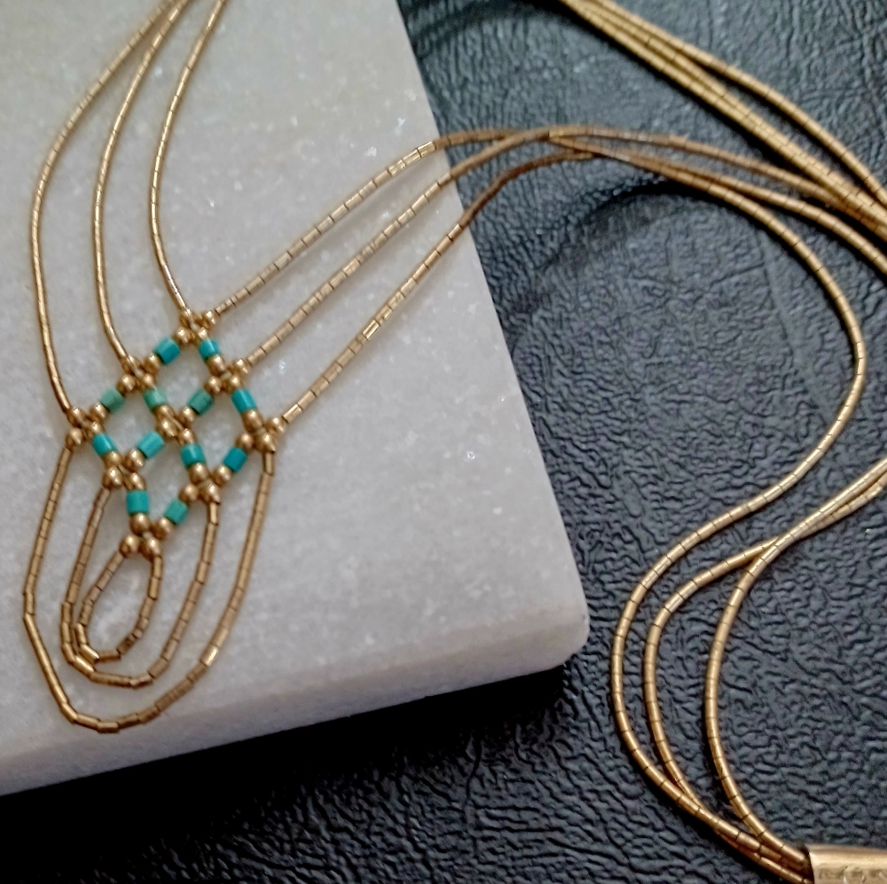 Beaded necklace in gold and Turquoise colors. Sterling silver 925 and signed